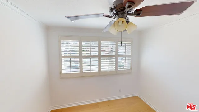 a view of a chandelier and a window in a room