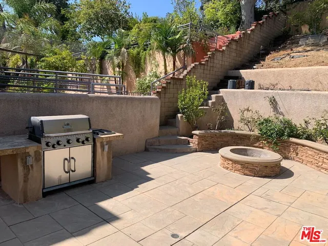 a view of a building with potted plants