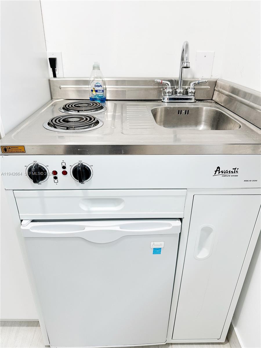 2400 Northwest 9th Street, Unit 3 Miami, FL 33125 - Photo 7 of 10 a close view of sink and stove