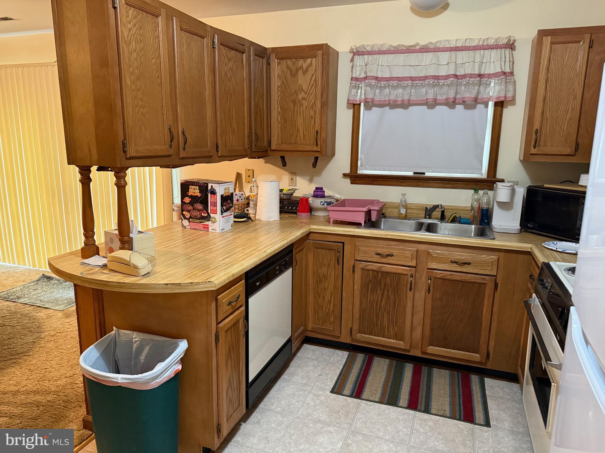 7206 Old Dickersons Road Orange, VA 22960 - Photo 12 of 32 a kitchen with sink a stove and cabinets