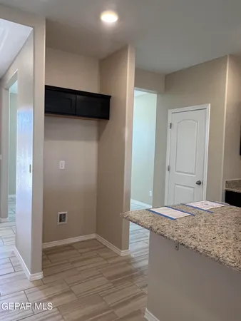 a view of a kitchen cabinets