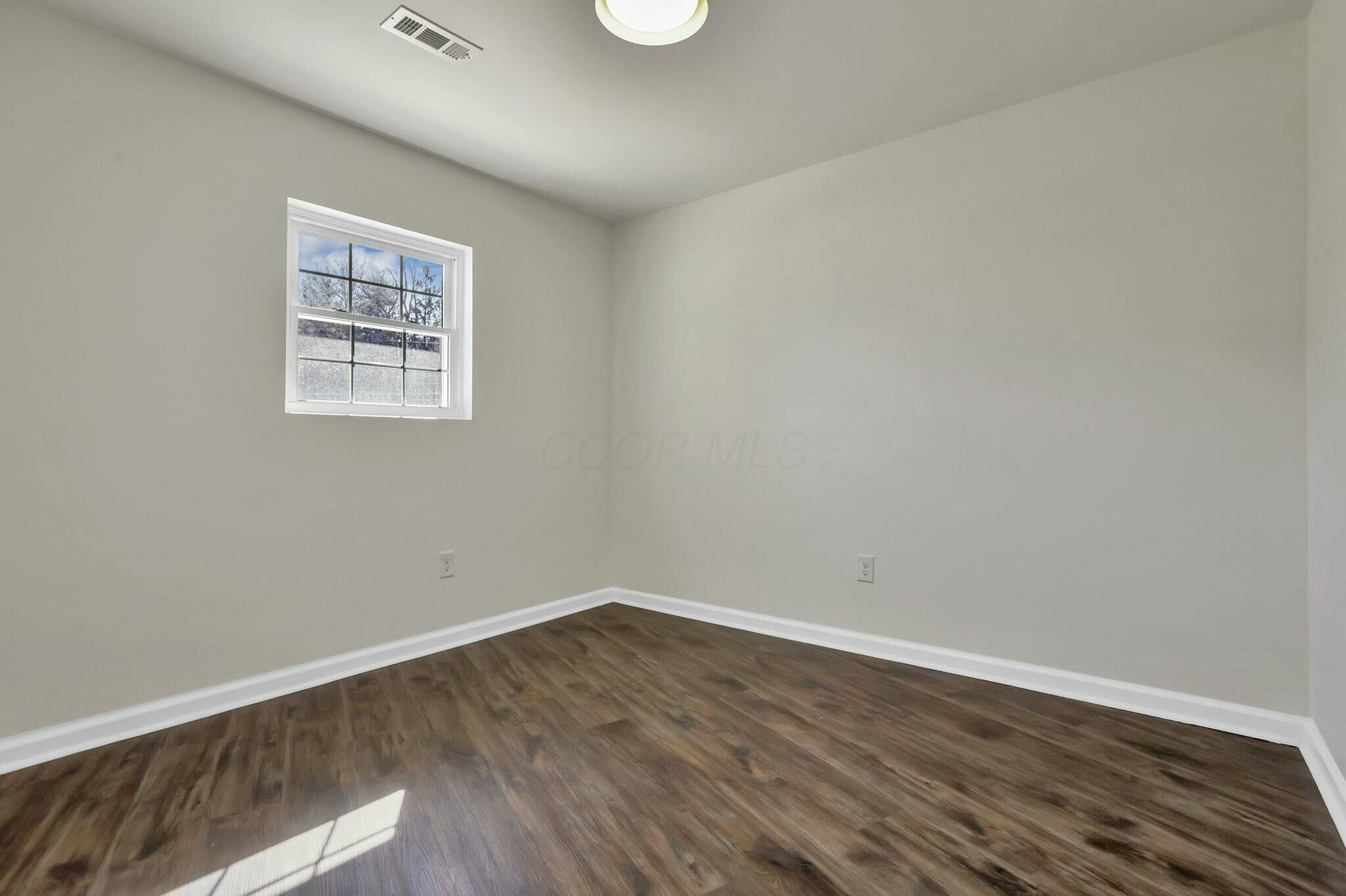 3301 Daglow Road Columbus, OH 43232 - Photo 22 of 60 Left side of the house Bedroom 1 - Would also make a perfect office!