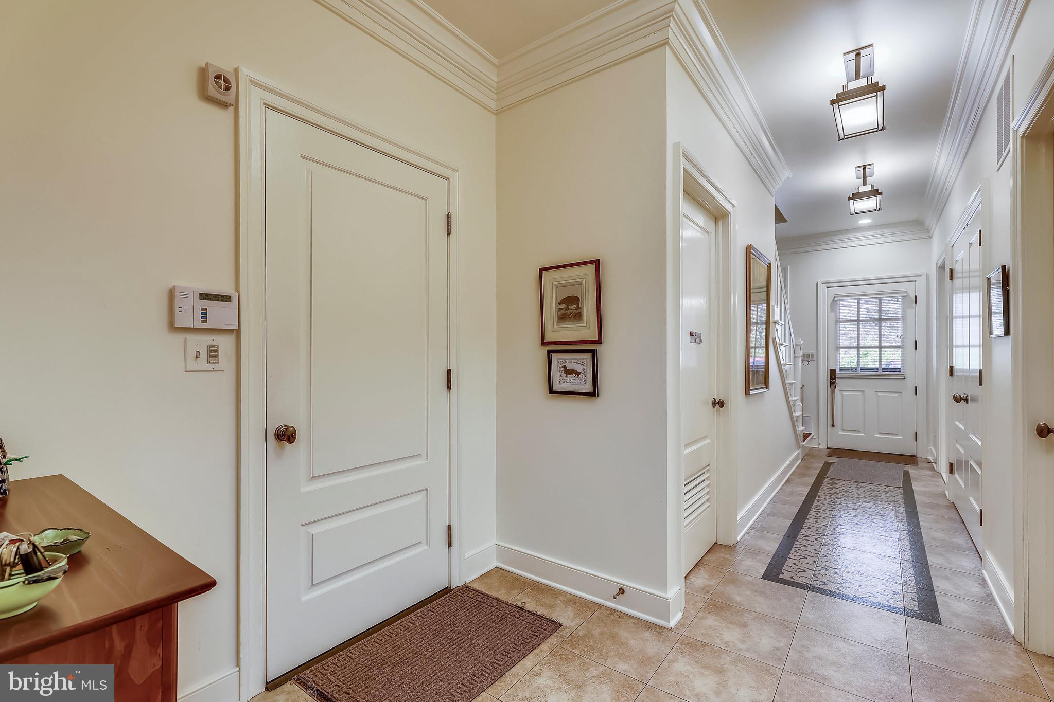 101 Taplow Road Baltimore, MD 21210 - Photo 21 of 59 a view of a hallway with closet and a livingroom