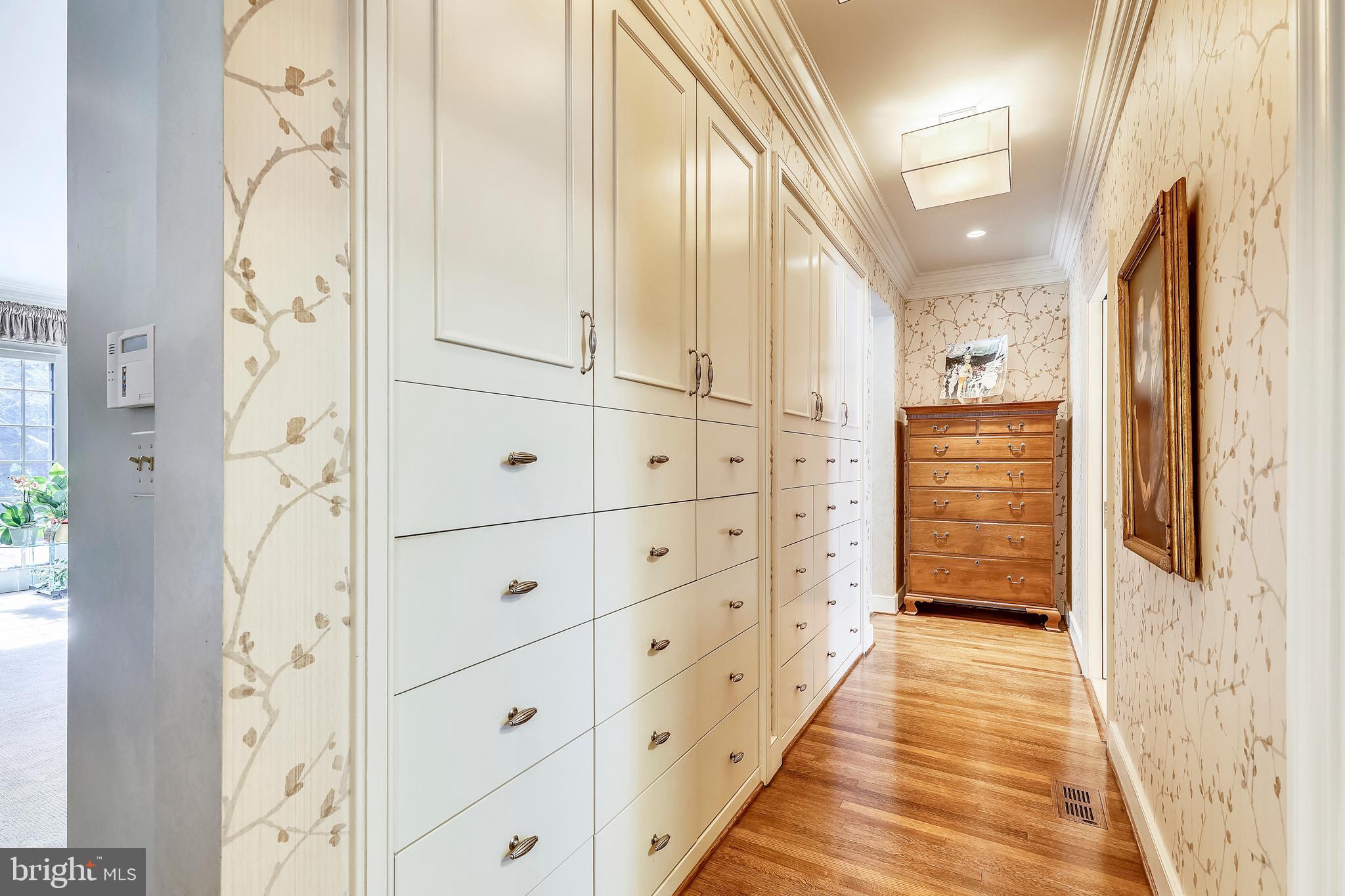 101 Taplow Road Baltimore, MD 21210 - Photo 22 of 59 a view of a hallway with wooden floor and staircase