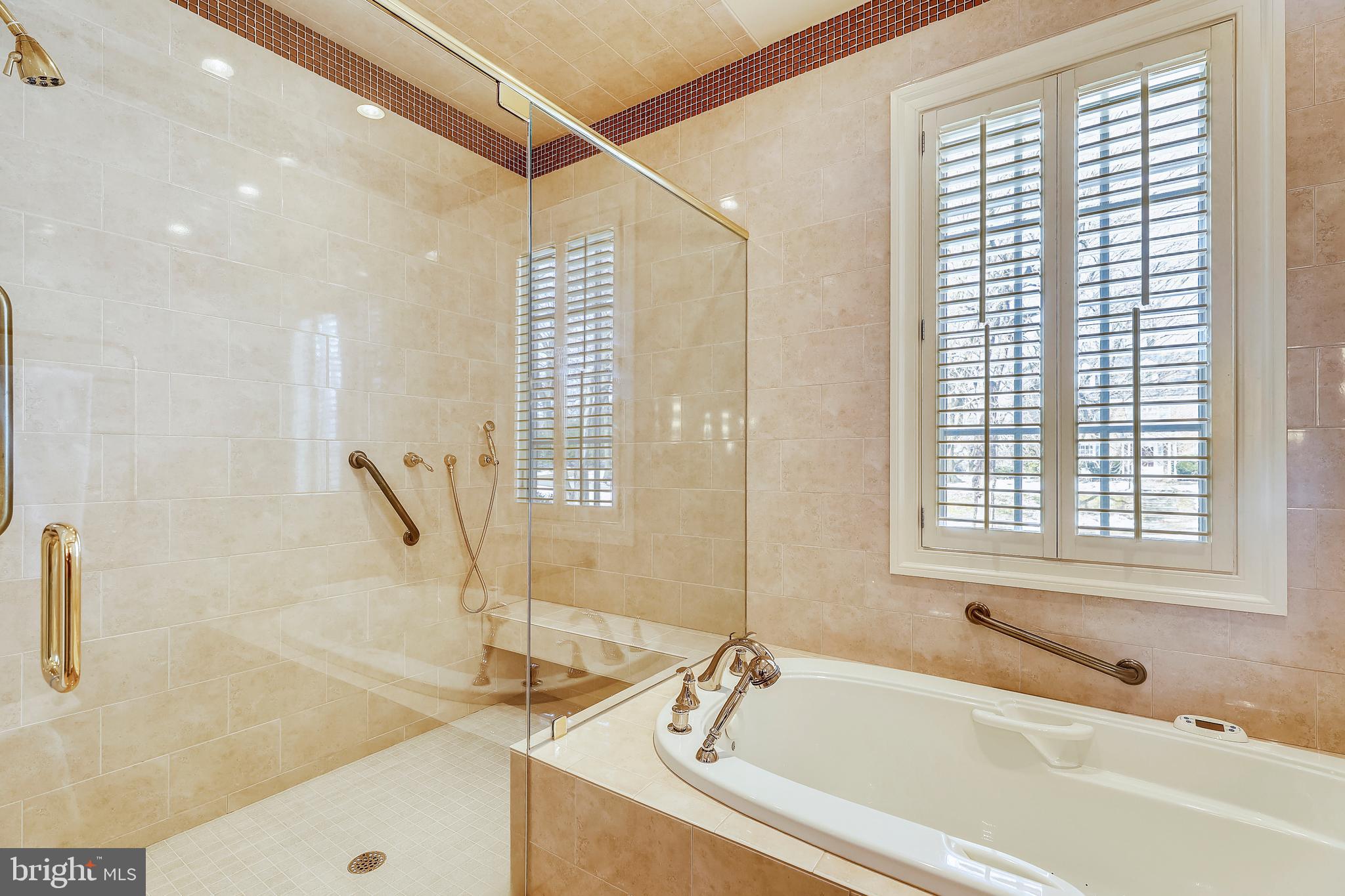 101 Taplow Road Baltimore, MD 21210 - Photo 29 of 59 a bathroom with a granite countertop tub and a sink