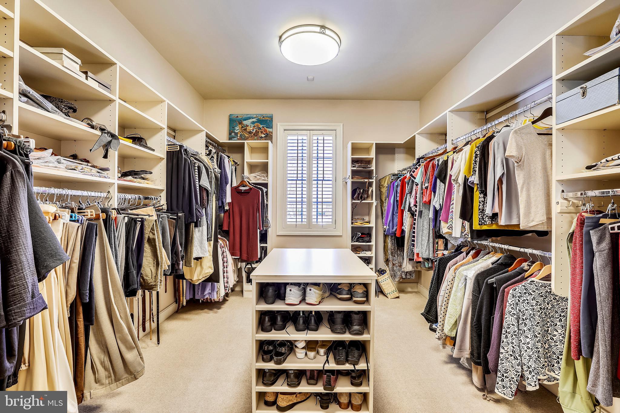 101 Taplow Road Baltimore, MD 21210 - Photo 30 of 59 a view of walk in closet with clothes and shoes