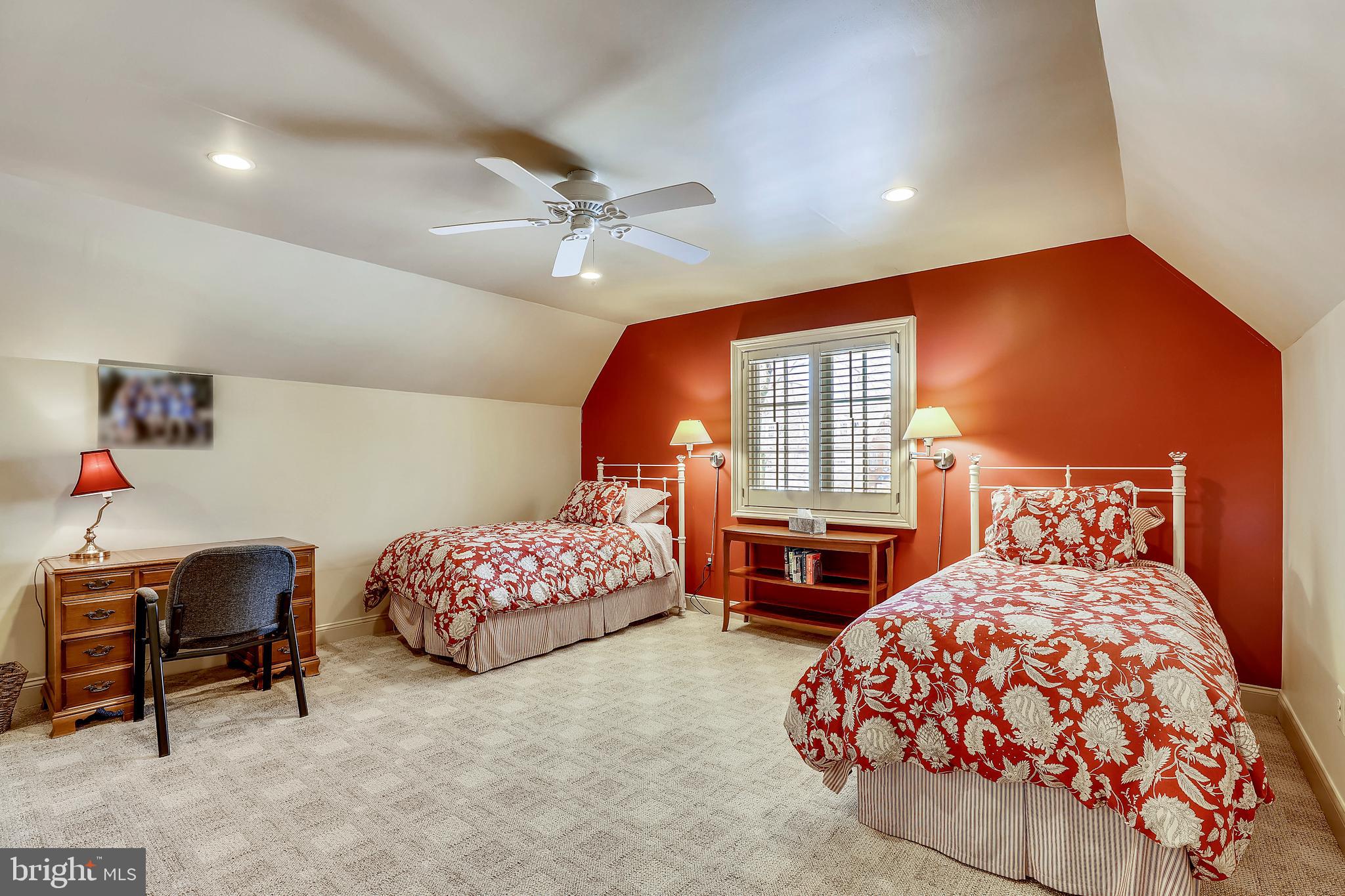 101 Taplow Road Baltimore, MD 21210 - Photo 43 of 59 a bedroom with a bed and a chandelier