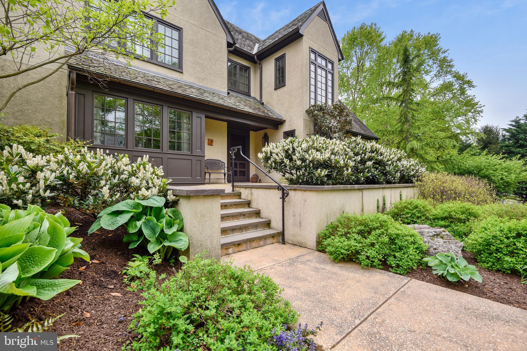101 Taplow Road Baltimore, MD 21210 - Photo 47 of 59 a front view of a house with a garden