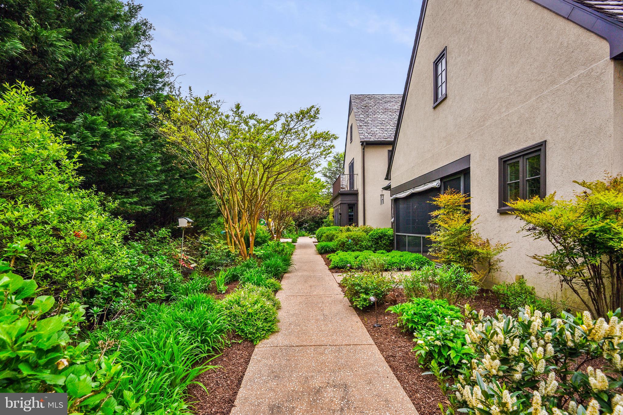 101 Taplow Road Baltimore, MD 21210 - Photo 48 of 59 a view of a pathway with house on both side