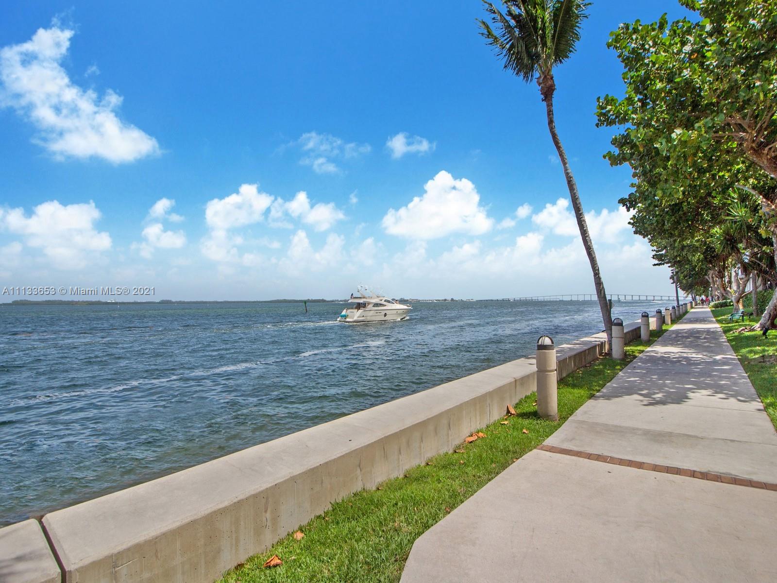 520 Brickell Key Drive, Unit A1815 Miami, FL 33131 - Photo 23 of 34 a view of a pathway with a yard