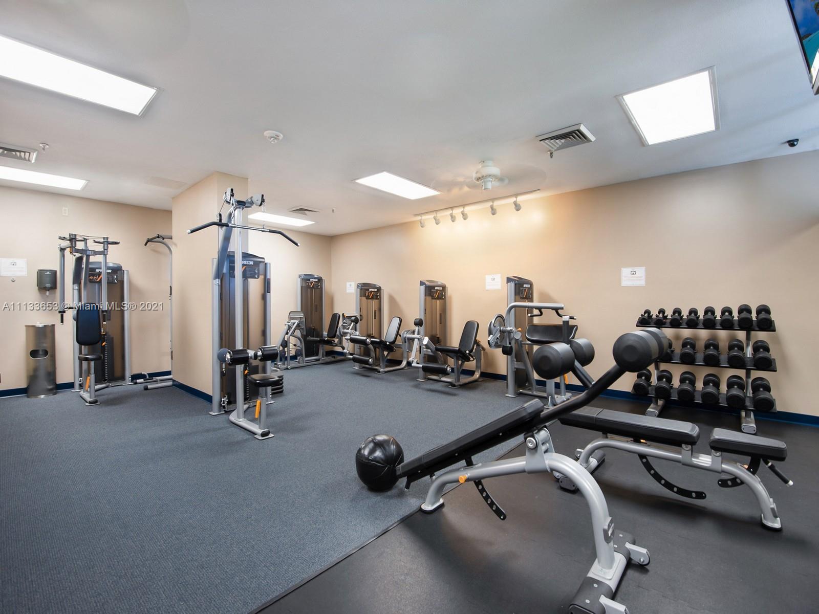 520 Brickell Key Drive, Unit A1815 Miami, FL 33131 - Photo 26 of 34 a view of a room with gym equipment