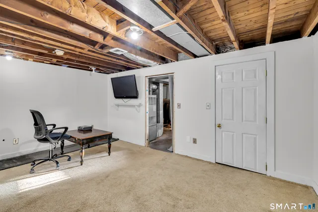 a view of a livingroom with furniture