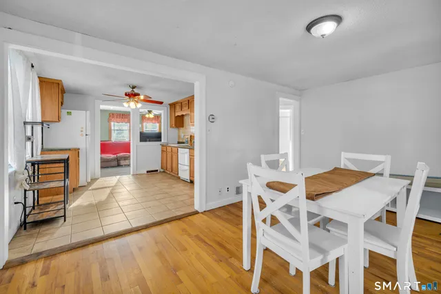 a view of a livingroom with furniture and wooden floor