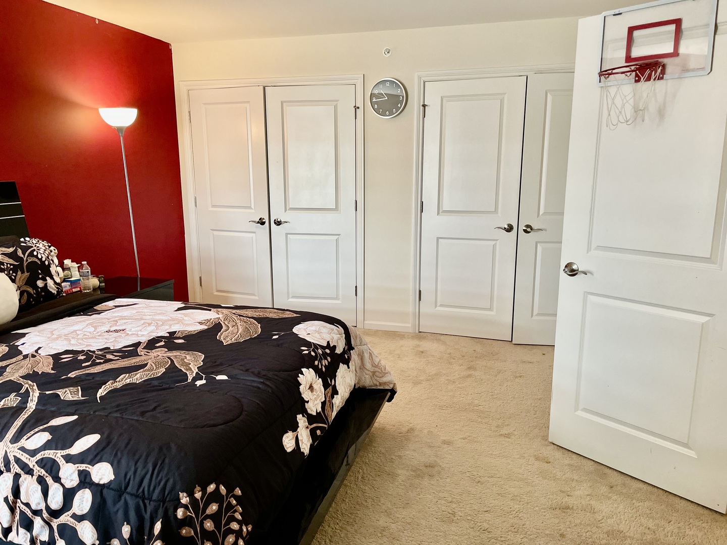 2018 Shermer Road, Unit 2018 Glenview, IL 60026 - Photo 29 of 39 a bedroom with a bed and a lamp