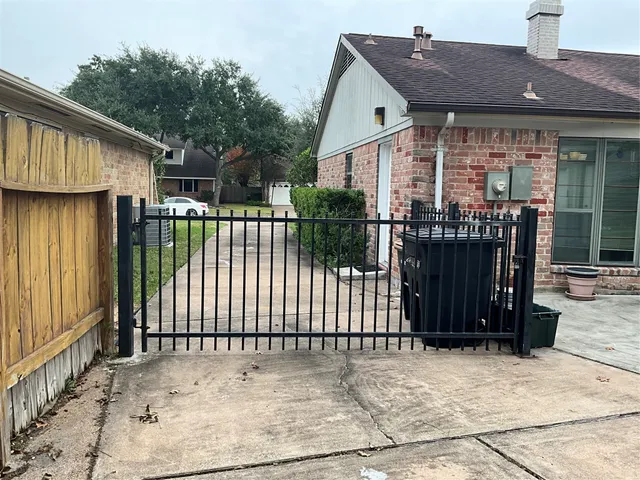 a view of house and tree in the patio