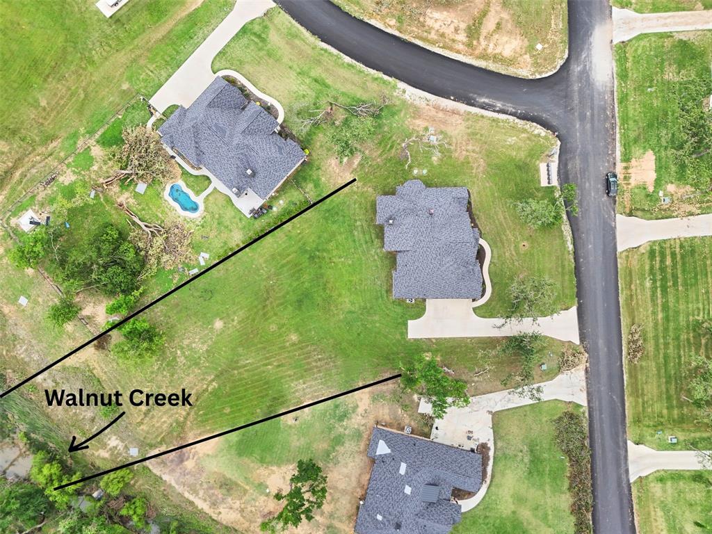 105 Clayton Crossing Springtown, TX 76082 - Photo 30 of 40 an aerial view of a garden