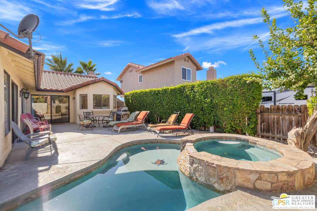 45688 Sutter Creek Road Indio, CA 92201 - Photo 47 of 51 a view of a house with swimming pool and sitting area