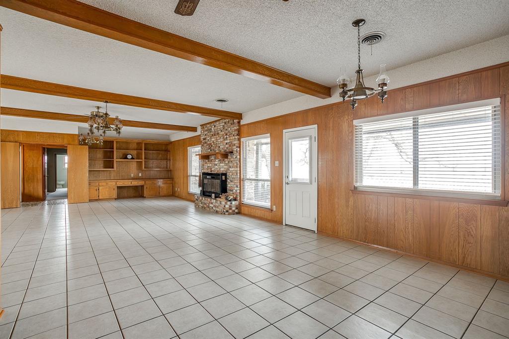 938 County Road 3341 Paradise, TX 76073 - Photo 19 of 40 a view of an empty room with a window
