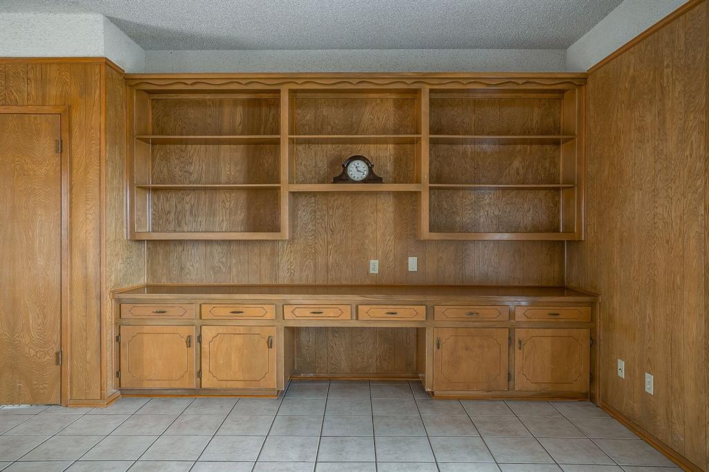 938 County Road 3341 Paradise, TX 76073 - Photo 28 of 40 a view of a kitchen with cabinets