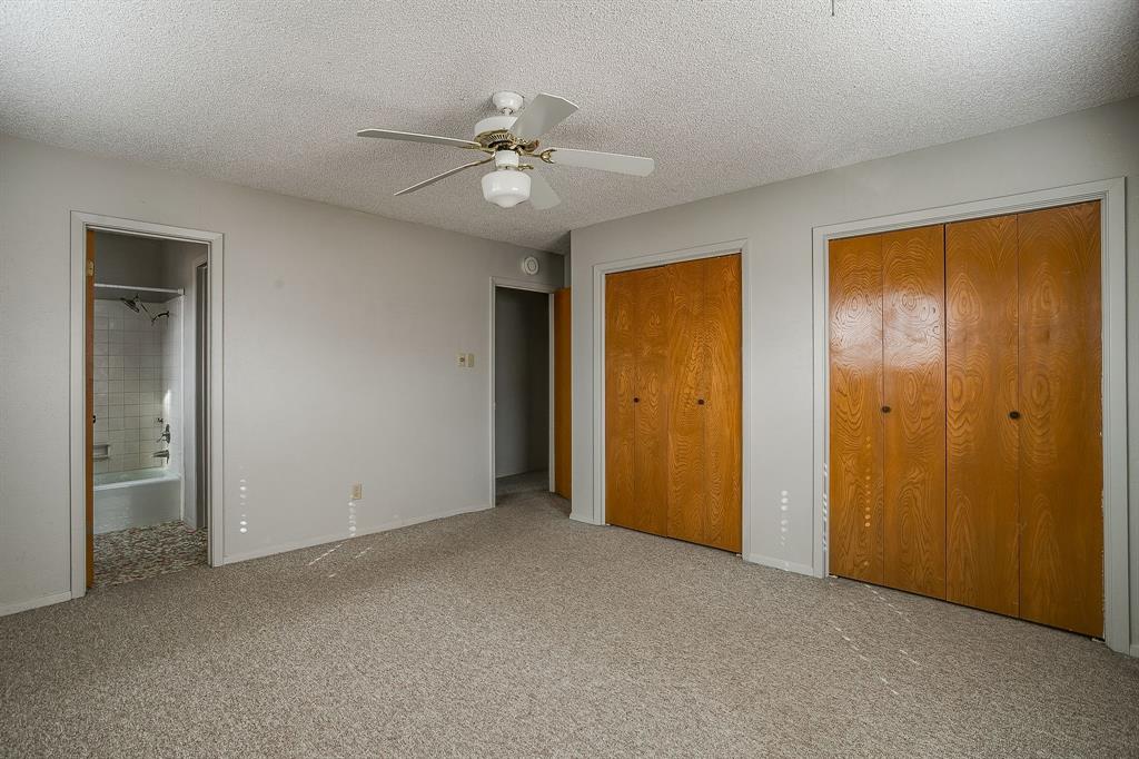 938 County Road 3341 Paradise, TX 76073 - Photo 35 of 40 a view of an empty room with a fan