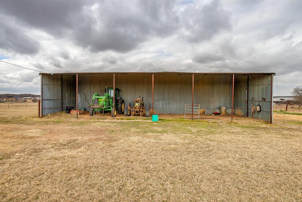 938 County Road 3341 Paradise, TX 76073 - Photo 40 of 40 a view of a swimming pool and an outdoor seating