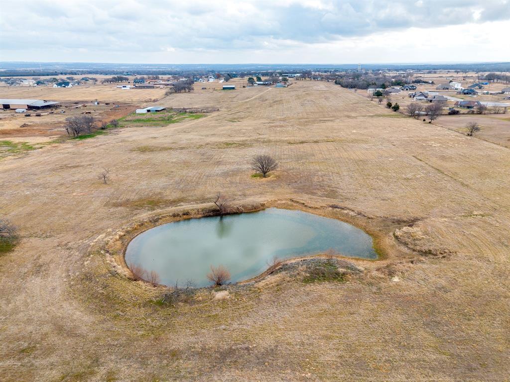 938 County Road 3341 Paradise, TX 76073 - Photo 6 of 40 a view of outdoor space and beach