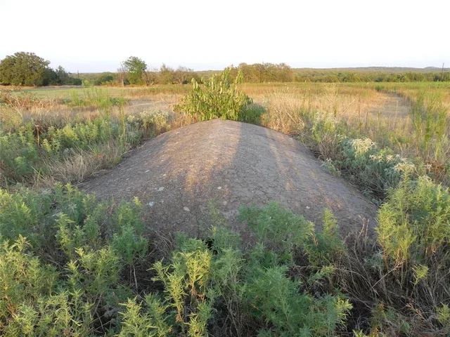 a view of lake with green space