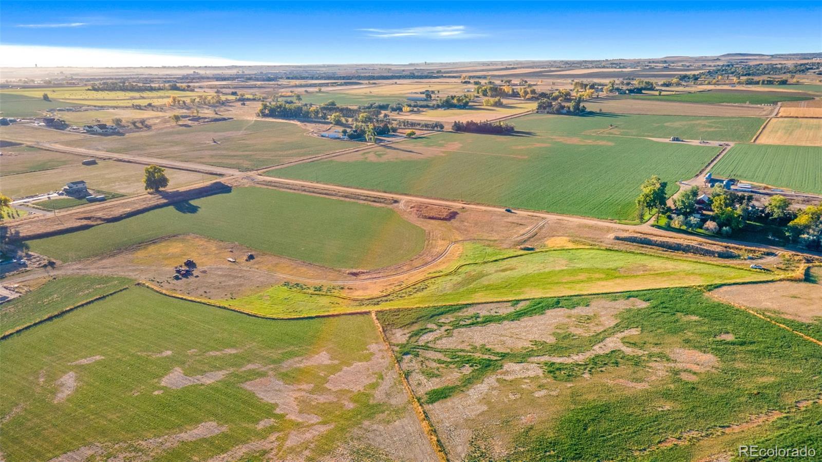 16 1/2 County Road Frederick, CO 80504 - Photo 16 of 16 a view of a lake and a city