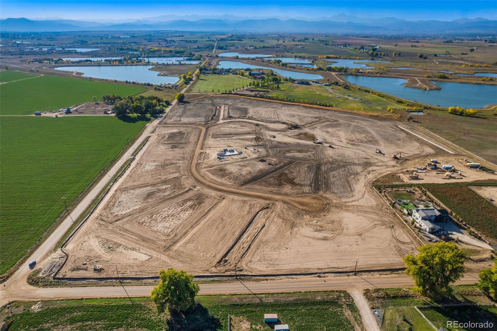 16 1/2 County Road Frederick, CO 80504 - Photo 5 of 16 a view of a swimming pool with a yard