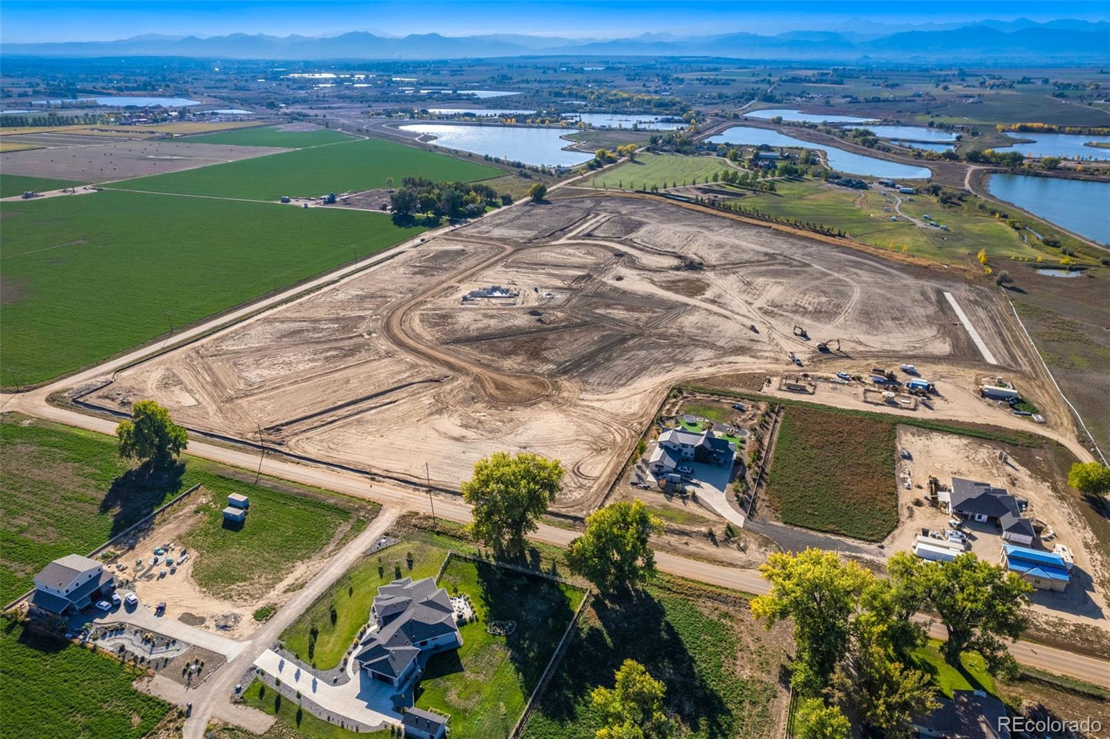 16 1/2 County Road Frederick, CO 80504 - Photo 6 of 16 an aerial view of a house with a yard