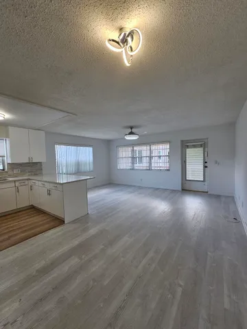 a view of kitchen and window