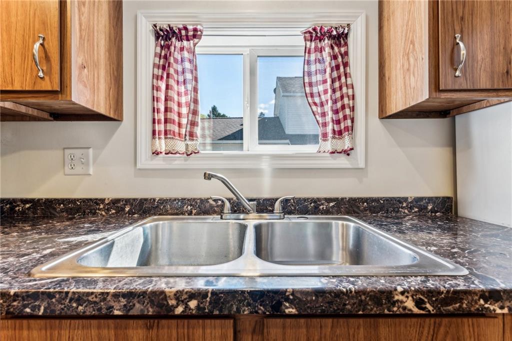1746 Soap Hollow Road Johnstown, PA 15905 - Photo 13 of 30 a kitchen with a sink a stove and a window