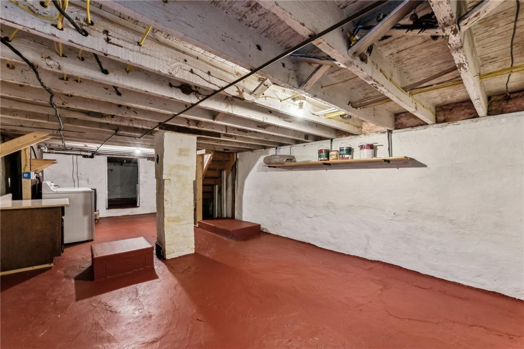 1746 Soap Hollow Road Johnstown, PA 15905 - Photo 23 of 30 a view of water heater room with wooden floor