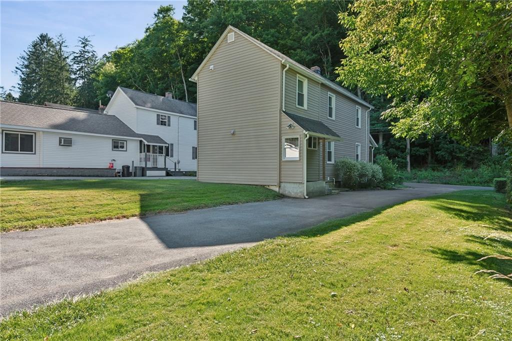 1746 Soap Hollow Road Johnstown, PA 15905 - Photo 28 of 30 a view of a house with a yard and plants