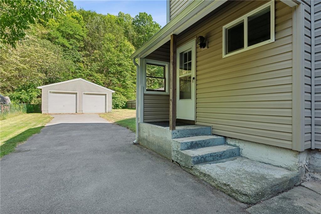 1746 Soap Hollow Road Johnstown, PA 15905 - Photo 4 of 30 a front view of a house with a yard and garage