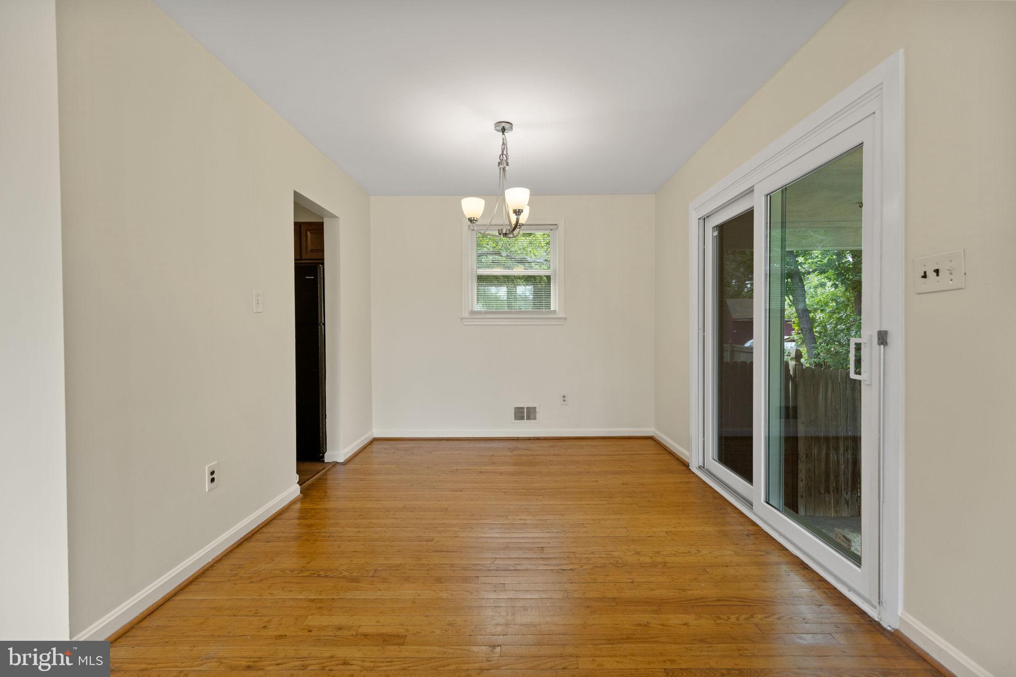 5508 Spruce Drive Clinton, MD 20735 - Photo 12 of 31 an empty room with windows and entrance