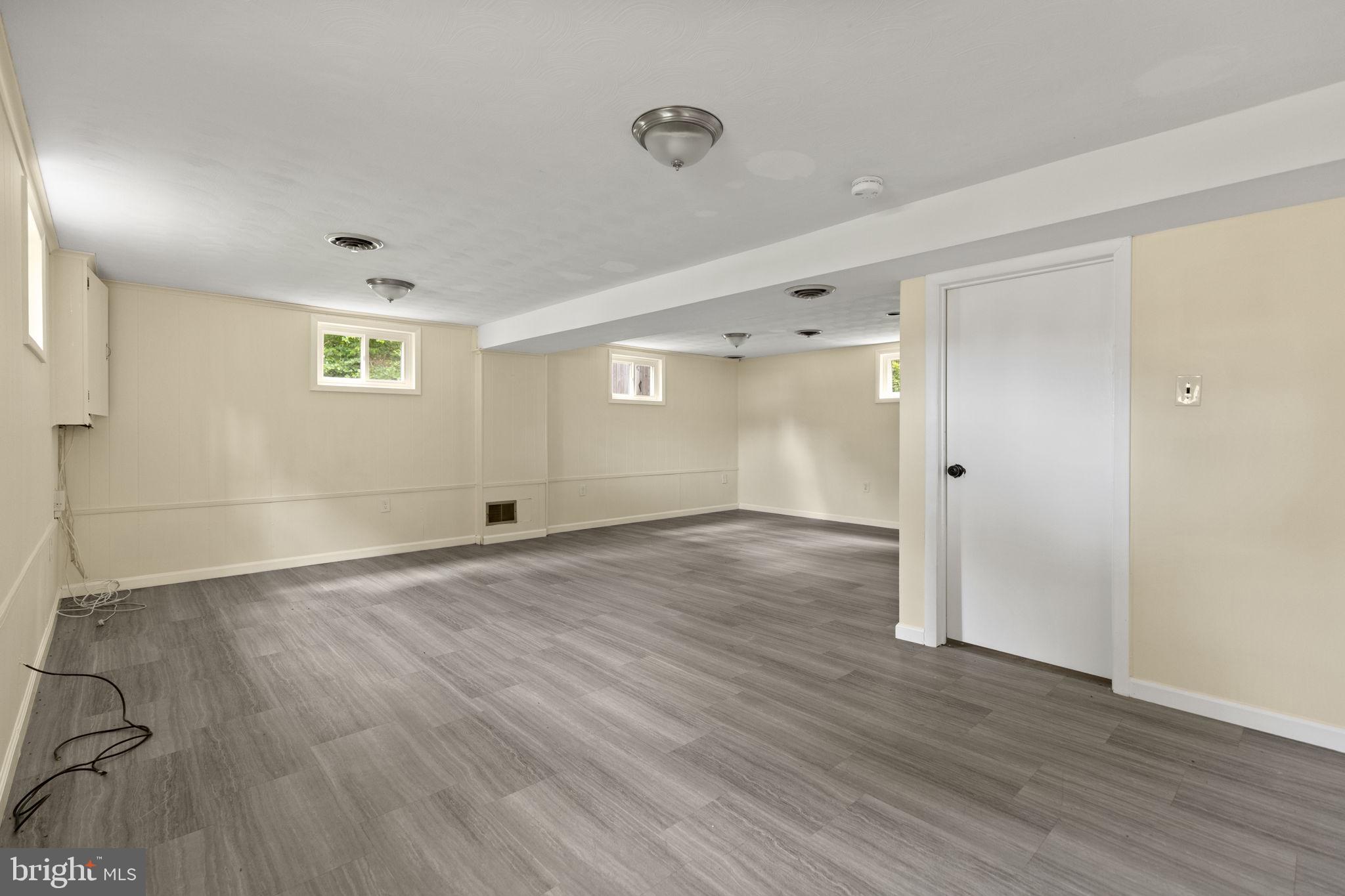 5508 Spruce Drive Clinton, MD 20735 - Photo 22 of 31 wooden floor in an empty room