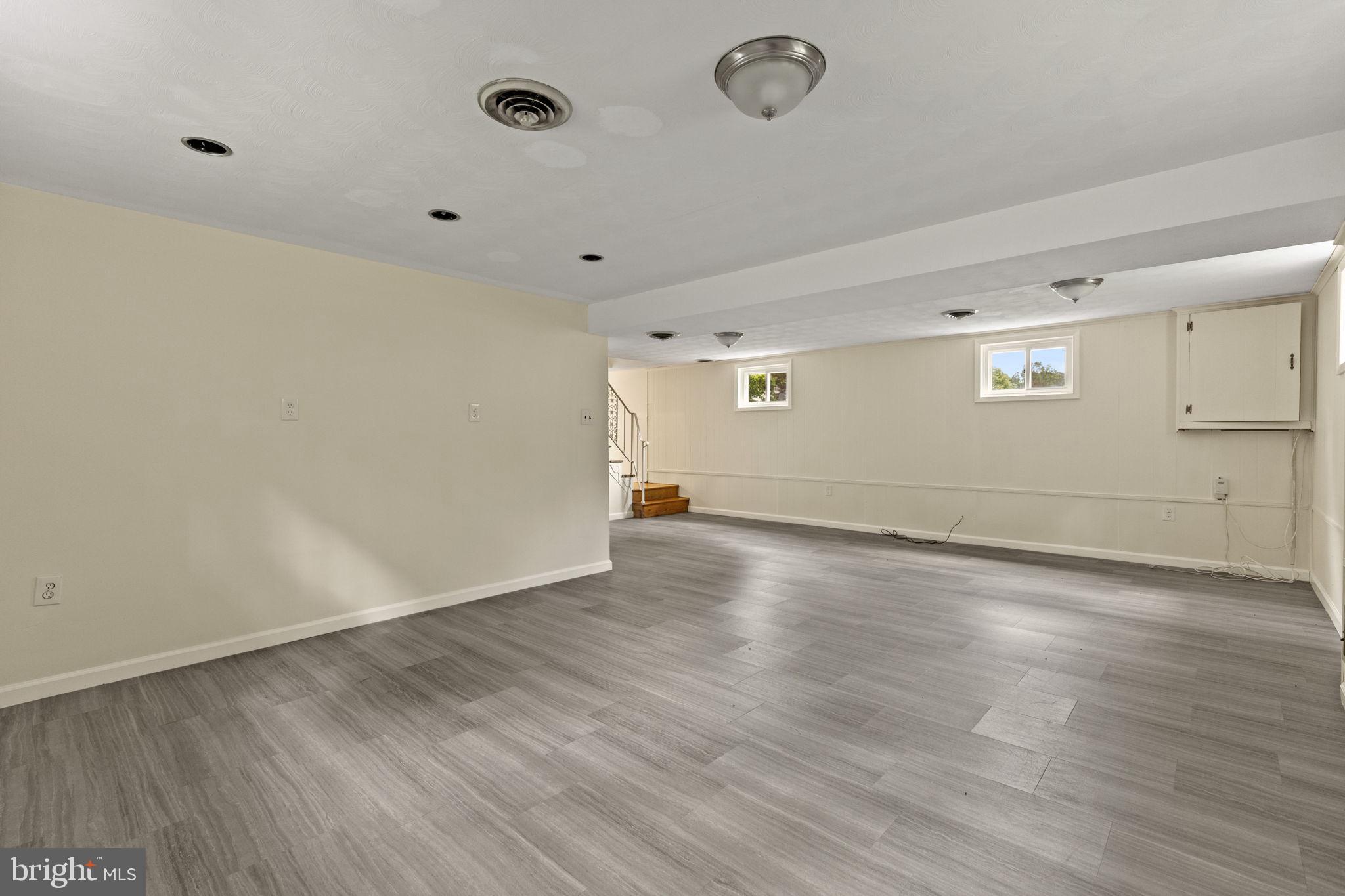 5508 Spruce Drive Clinton, MD 20735 - Photo 23 of 31 an empty room with wooden floor