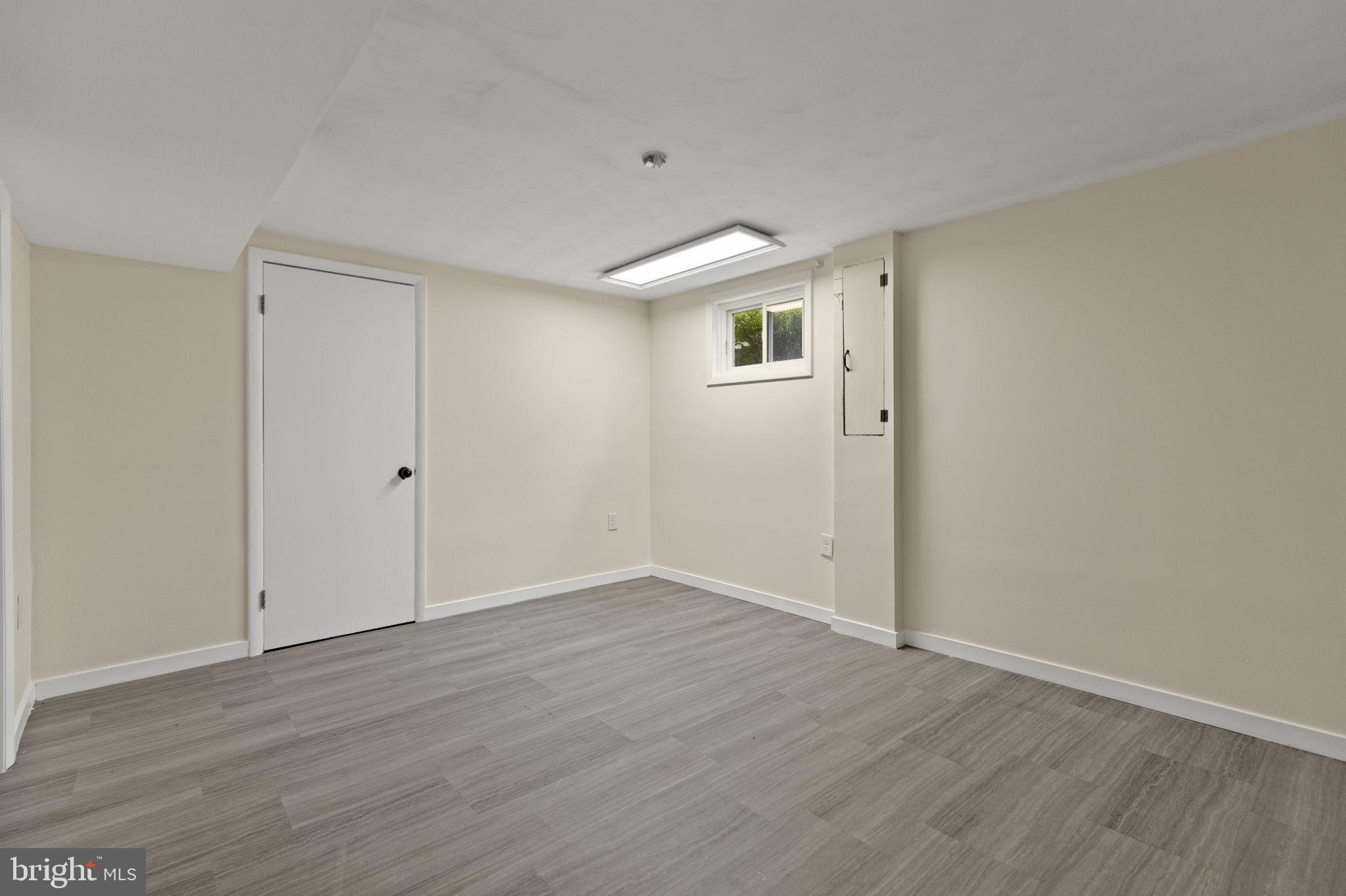 5508 Spruce Drive Clinton, MD 20735 - Photo 24 of 31 a view of an empty room with wooden floor