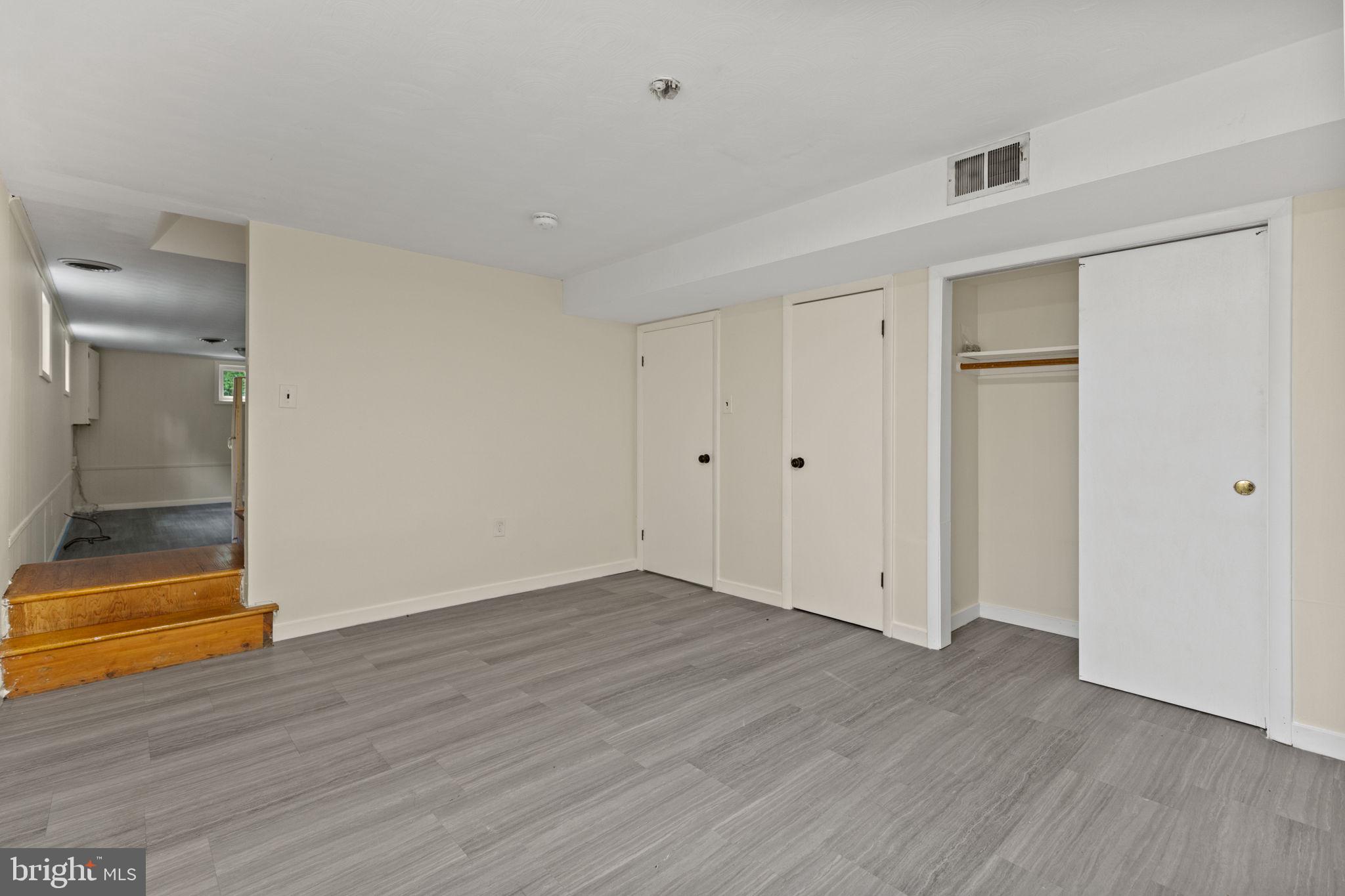 5508 Spruce Drive Clinton, MD 20735 - Photo 25 of 31 a view of an empty room with wooden floor