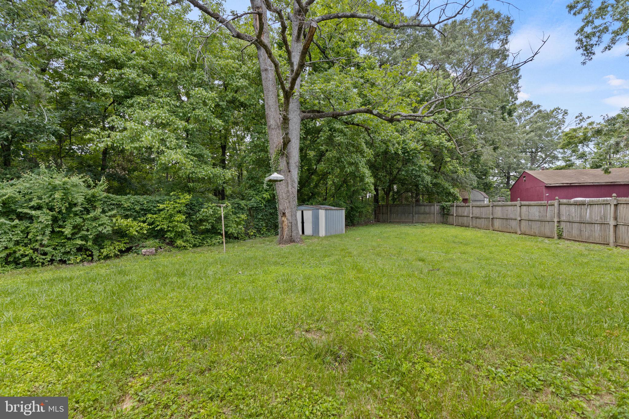 5508 Spruce Drive Clinton, MD 20735 - Photo 28 of 31 a view of a backyard with a small garden