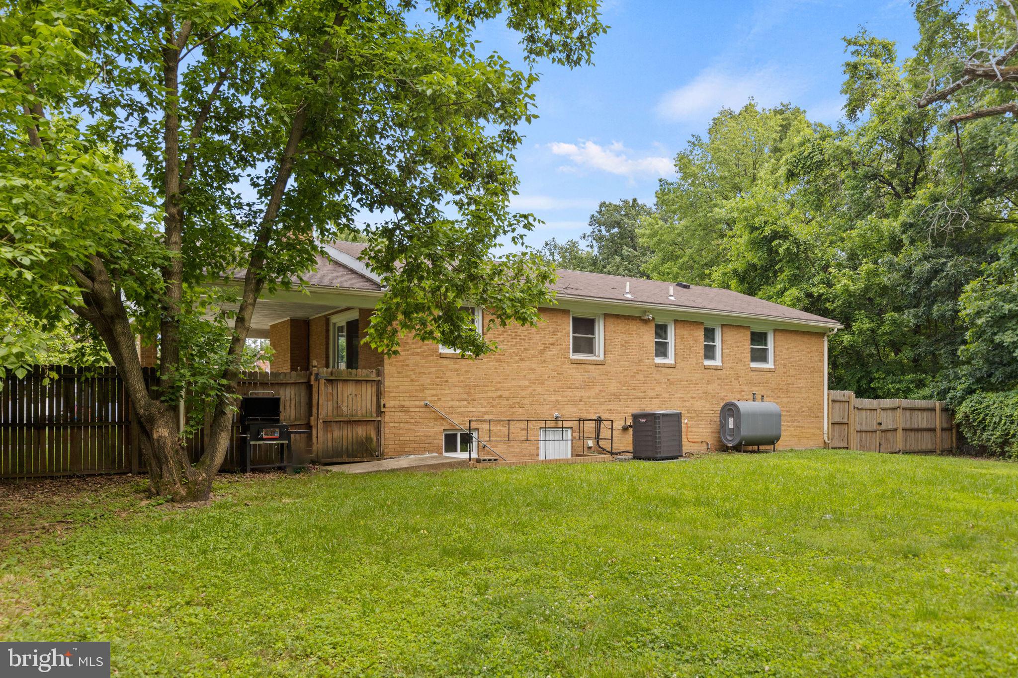 5508 Spruce Drive Clinton, MD 20735 - Photo 30 of 31 a front view of house with yard and green space
