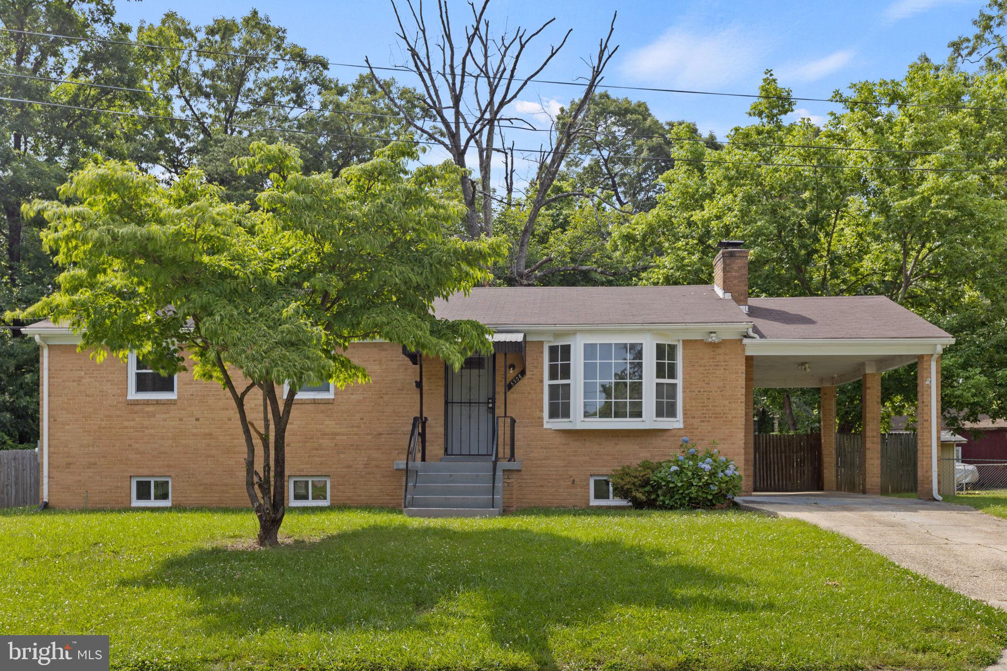 5508 Spruce Drive Clinton, MD 20735 - Photo 3 of 31 front view of a house with a yard