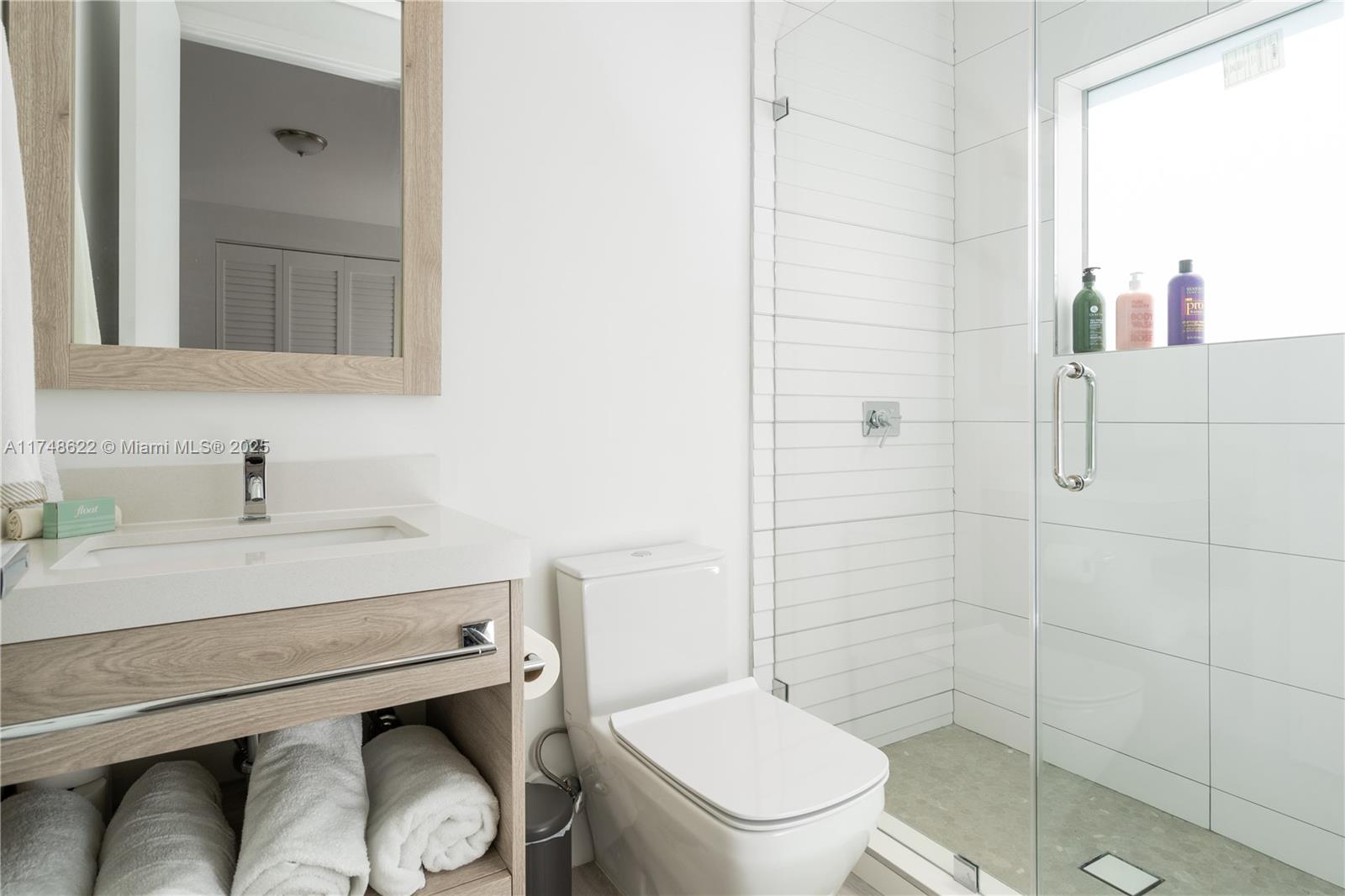 3572 Southwest 23rd Street, Unit 3572 Miami, FL 33145 - Photo 20 of 36 a bathroom with a sink toilet and shower