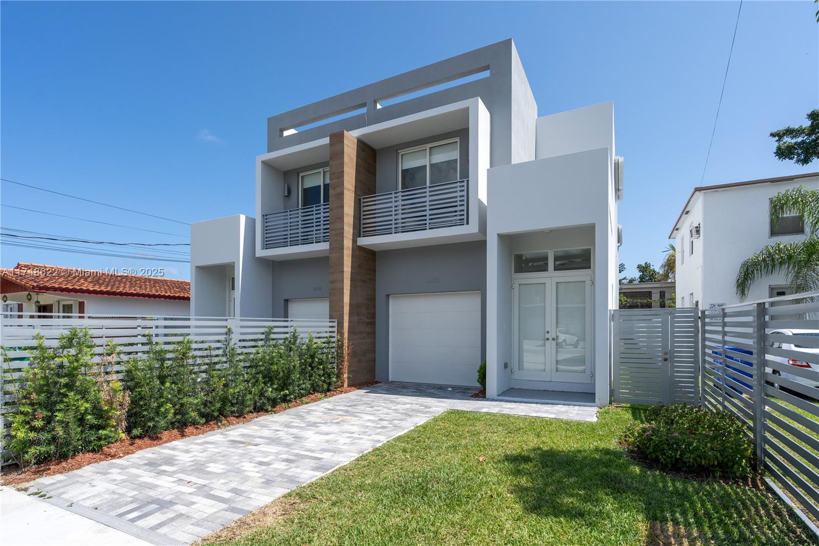 3572 Southwest 23rd Street, Unit 3572 Miami, FL 33145 - Photo 24 of 36 front view of a house with a yard