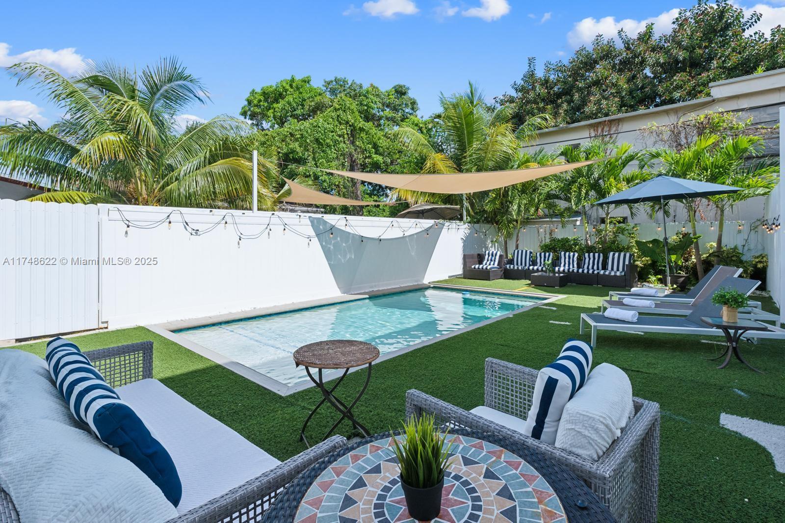 3572 Southwest 23rd Street, Unit 3572 Miami, FL 33145 - Photo 26 of 36 a view of an outdoor sitting area with furniture