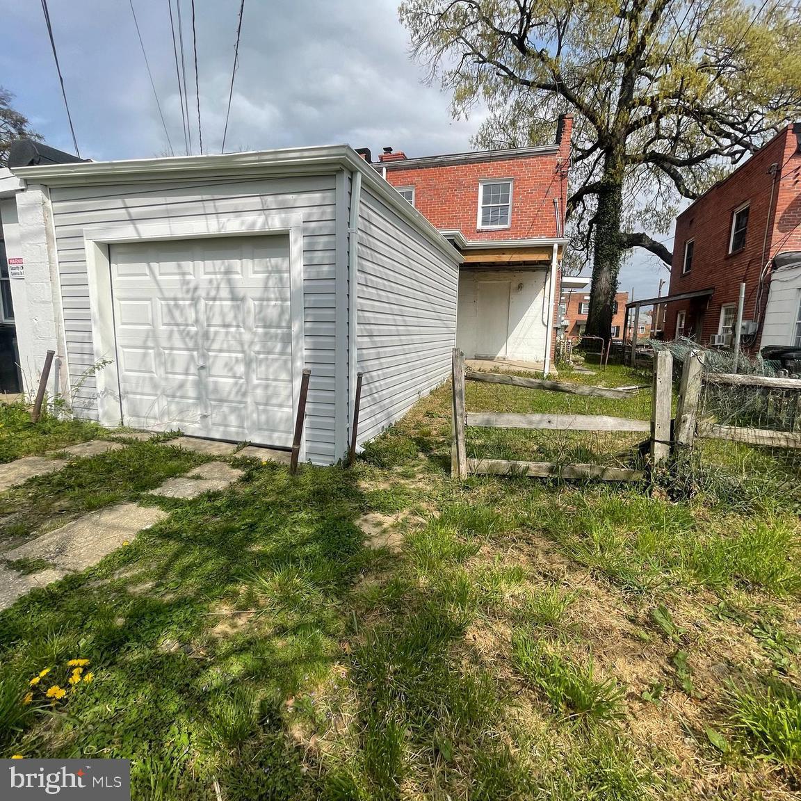 8528 Chestnut Oak Road, Unit A Baltimore, MD 21234 - Photo 5 of 7 a view of a house with a yard