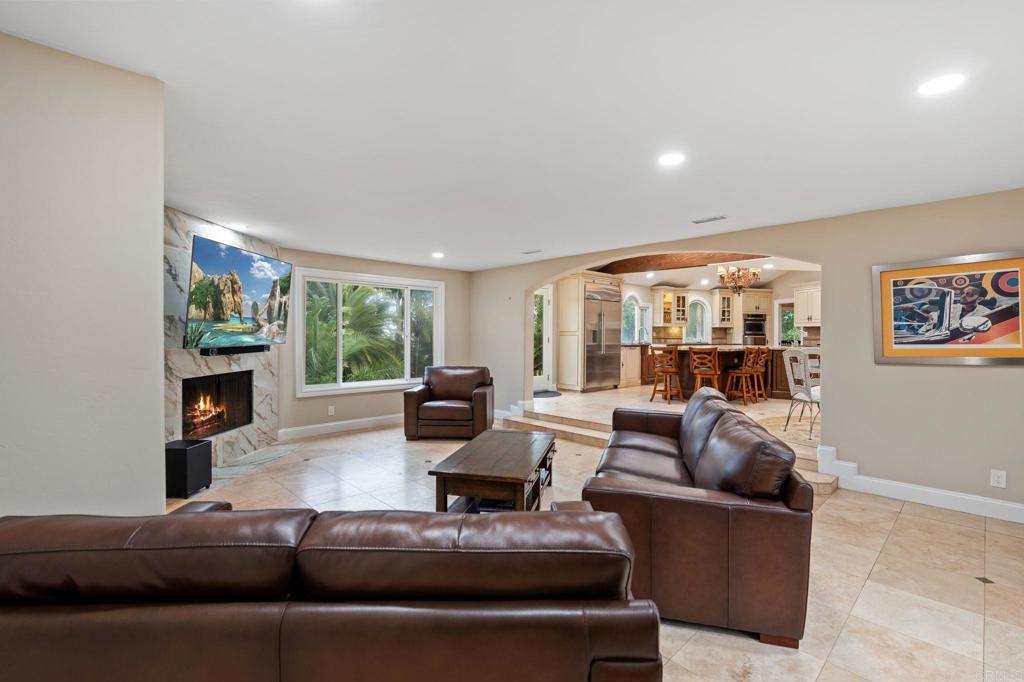 10845 Mystery Mountain Road Valley Center, CA 92082 - Photo 21 of 72 a living room with furniture and a large window
