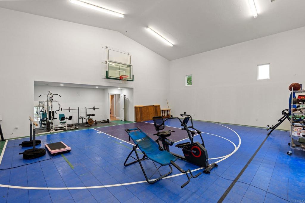 10845 Mystery Mountain Road Valley Center, CA 92082 - Photo 38 of 72 a living room with furniture and wooden floor