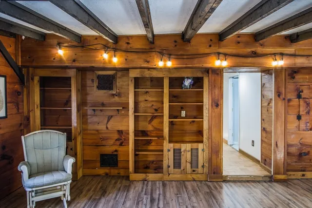 a view of livingroom with furniture and wooden floor